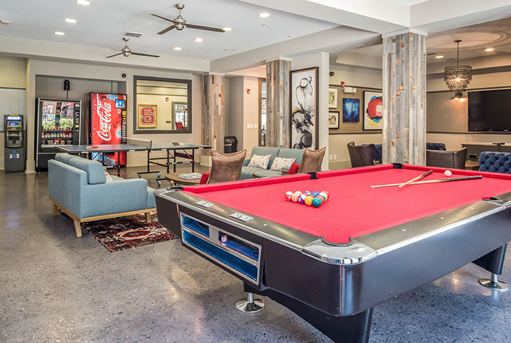 Resident clubhouse featuring a pool table